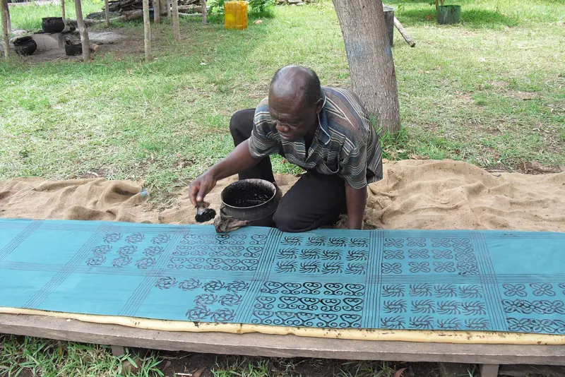 Hand-printing Adinkra symbols with natural dye