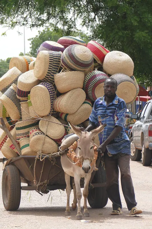 A basket seller and donkey cart, Bolgatanga