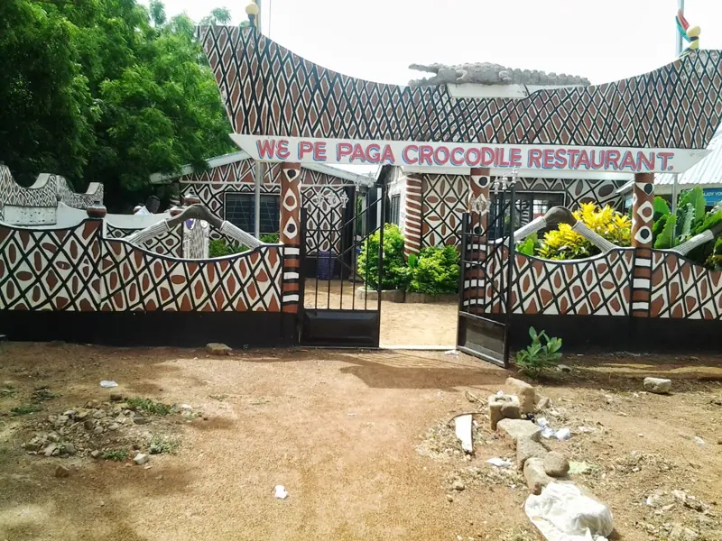 A painted restaurant by the Paga crocodile pond