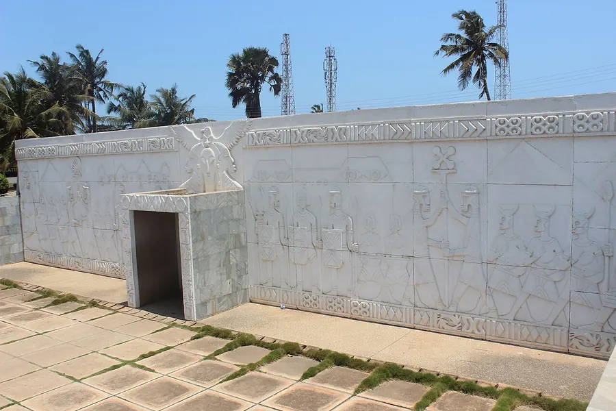 A carved white relief wall in the Kwame Nkrumah Memorial Park