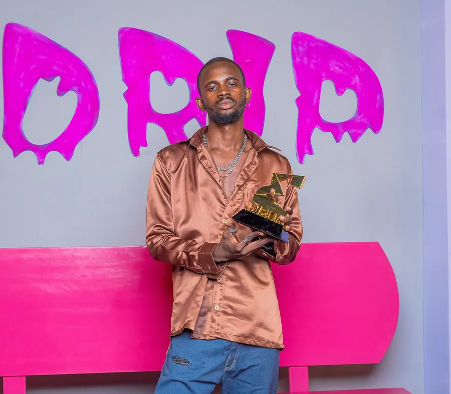 Black Sherif in a brown satin shirt at the 3Music Awards