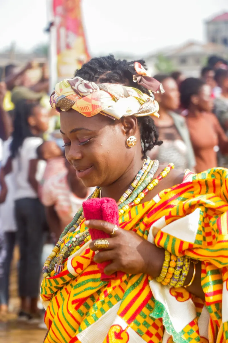 A woman in kente at the Aboakyer festival in Winneba