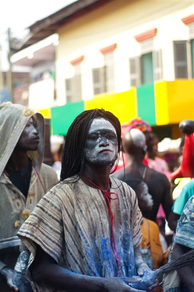 A festival participant with white face paint at Fetu Afahye