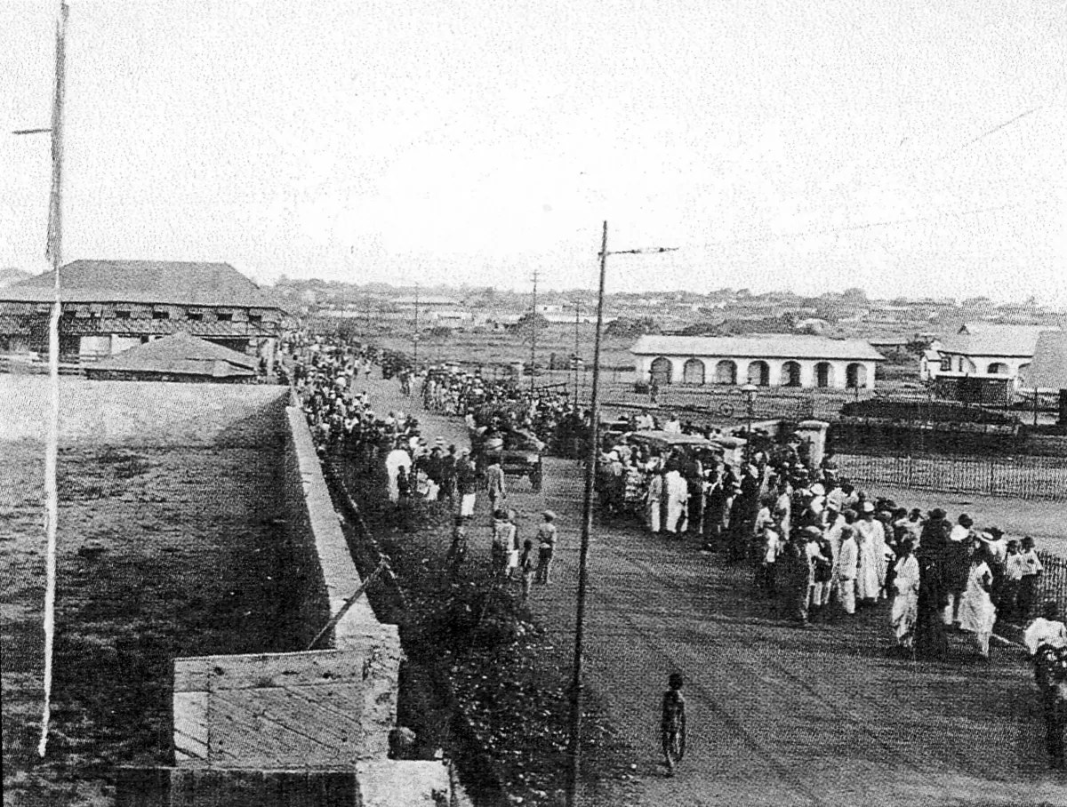 A crowded street in Accra during Homowo, around 1900