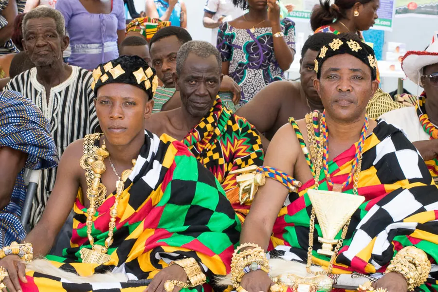 Chiefs and elders in bright kente seated at the Agbamevoza durbar
